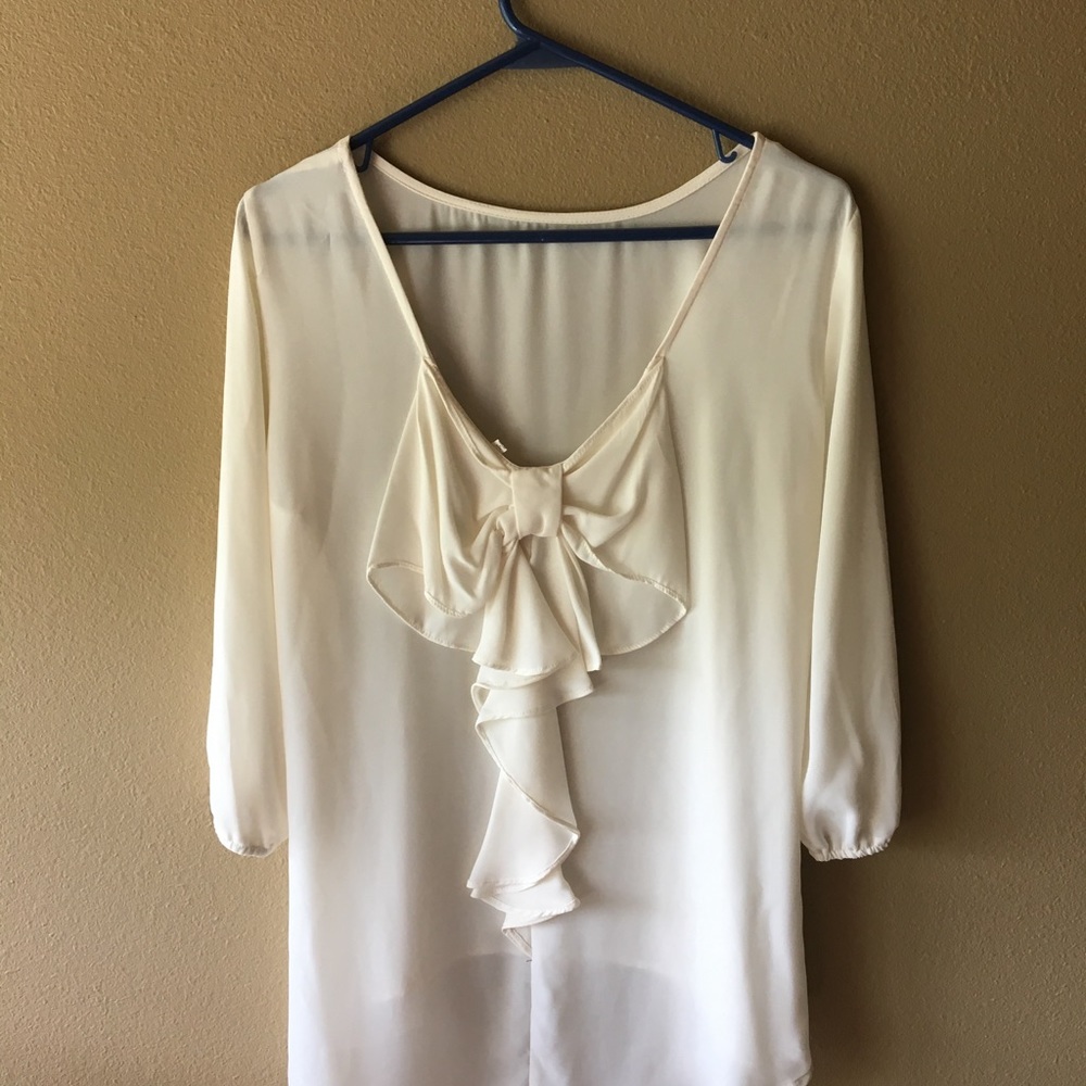 size L - long sleeve cream blouse